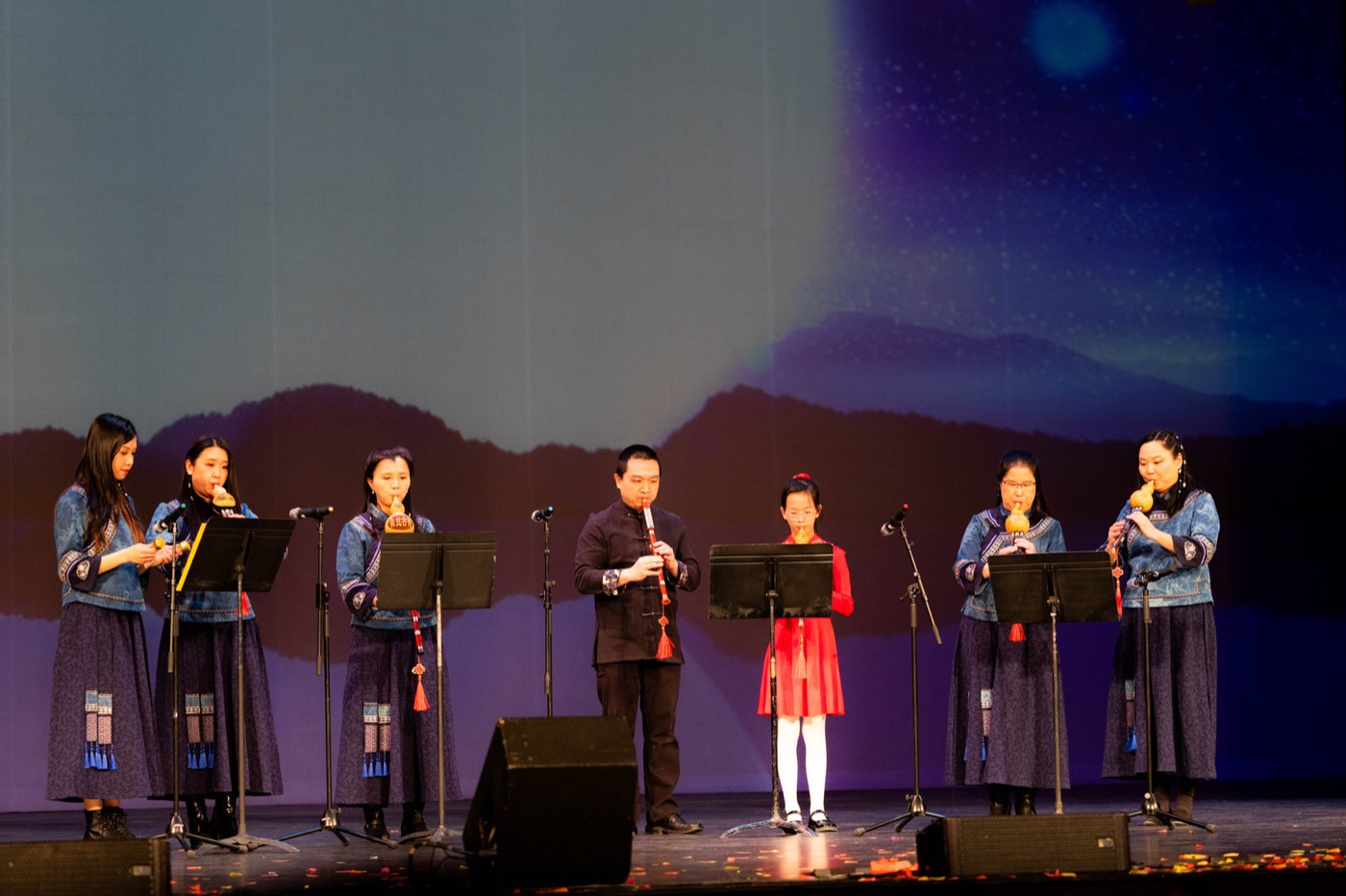 A Chinese music ensemble performs together